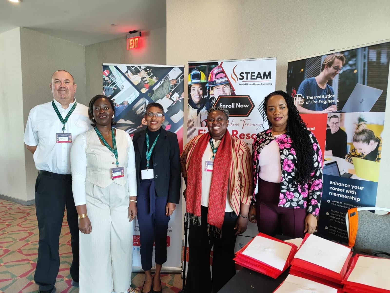 Delegates at STEAM and IFE membership stand at Jamaica 2025